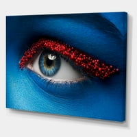 Designart 'Yüzünde Mavi Boya ve Kırmızı Toplarla Kadın Gözü' Modern Tuval Duvar Sanatı Baskısı
